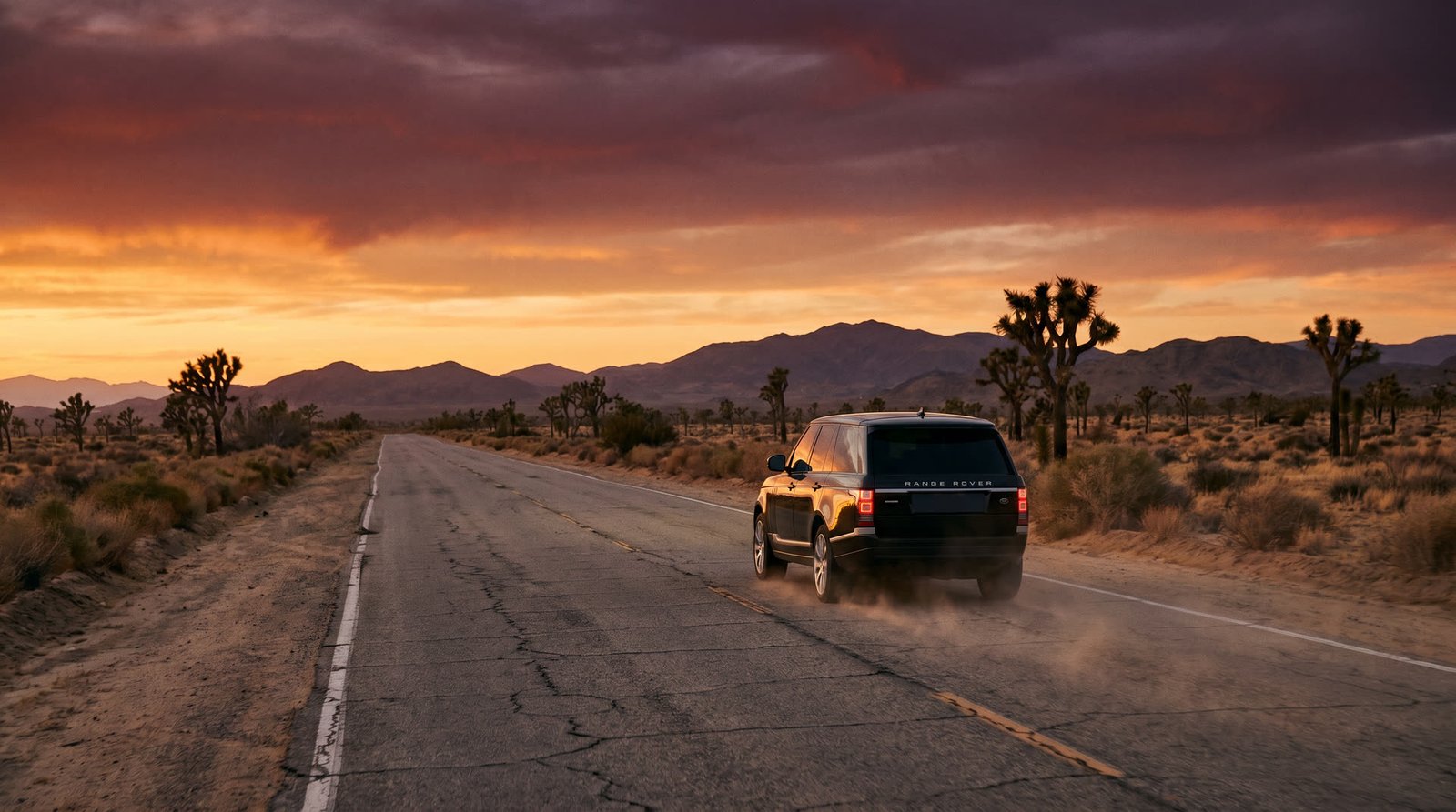 Empty desert highway at golden hour with luxury SUV cruising